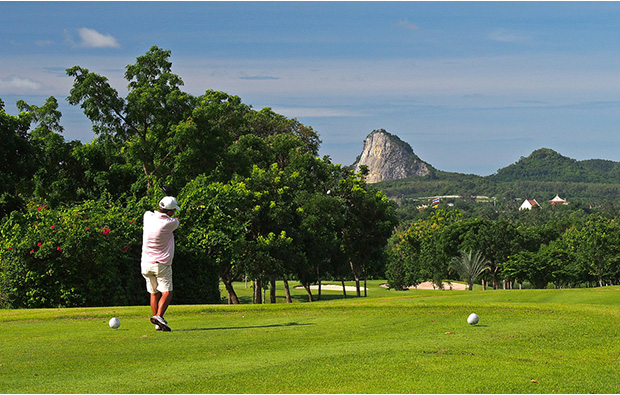 teeing off on  phoenix gold golf country club, pattaya, thailand